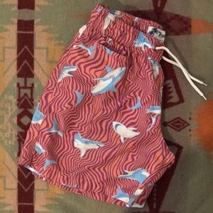 red-orange/ purple trunks with regular side pockets. no lining .